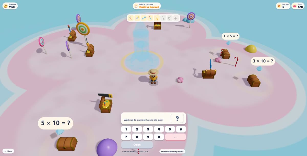 Build It! on Candy Island: tools floating above opened chests and a see-through rocket plan in the middle
