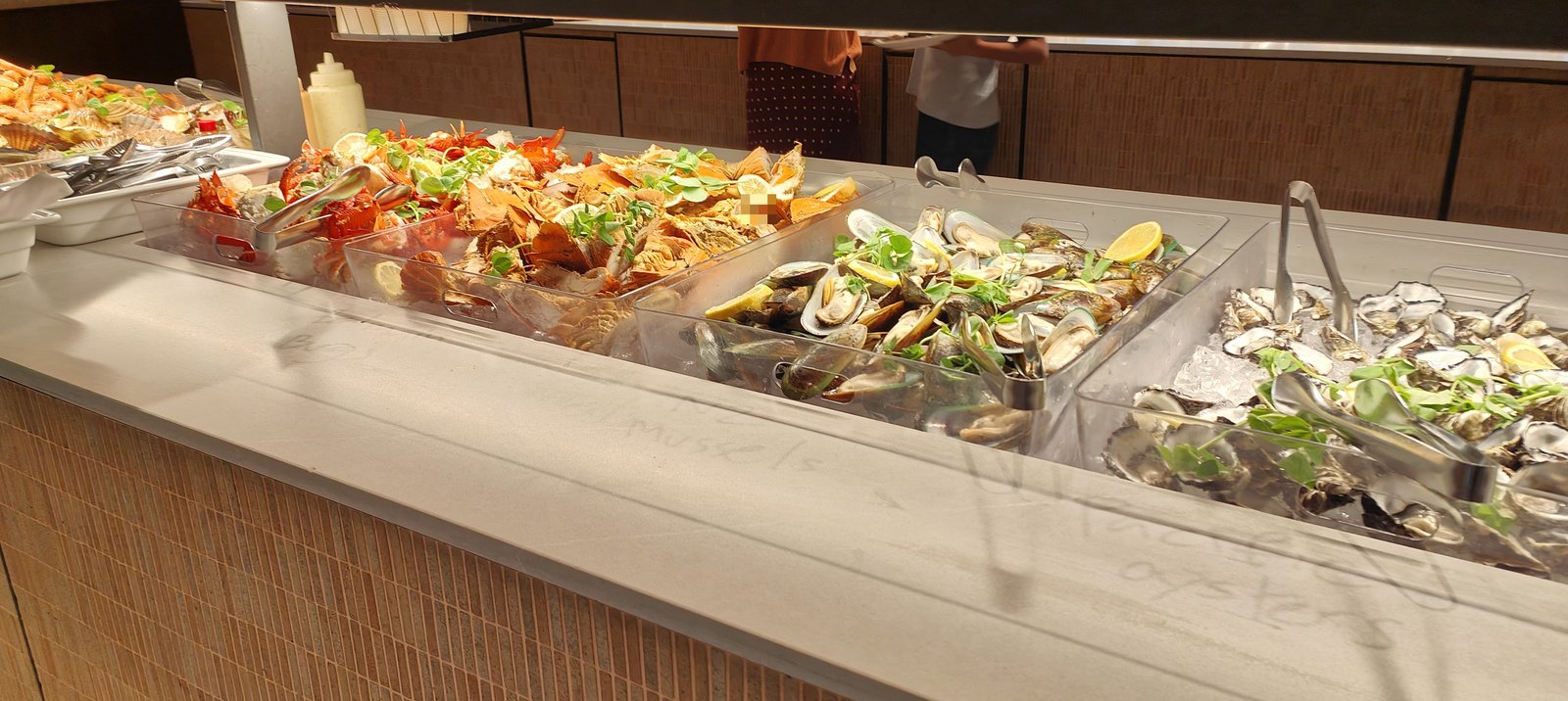 Australian seafood buffet: oysters, mussels and lobster on ice